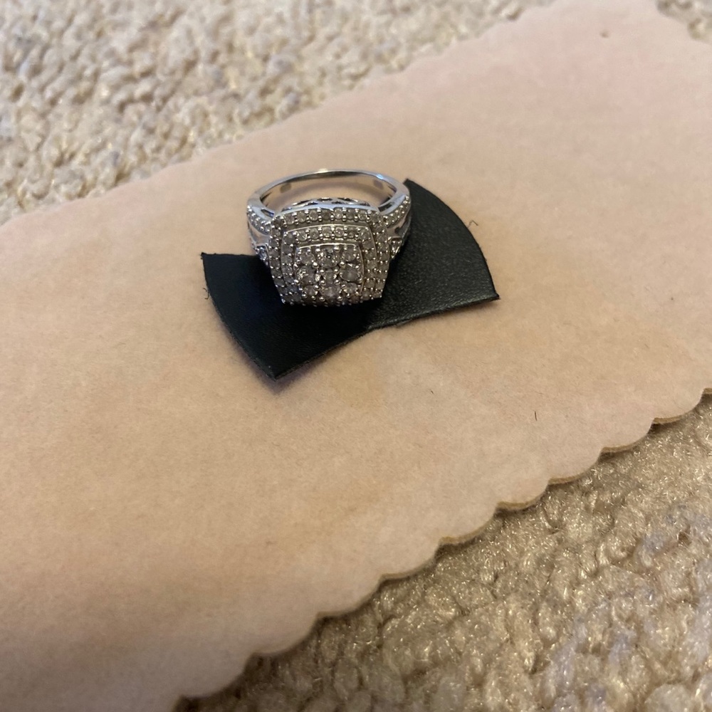 1 karat real diamond , sterling silver ring.